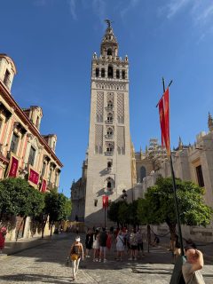 Ok, I have another love now: Sevilla.

Before the Romans built the city of Hispalis, the native Iberians and Phoenician traders were here. 

You can still see remains of the Romans in the town walls and the Vía Augusta, the long road that connected Cadiz on the Atlantic with the Pyrenees and then Rome. Later, Roman marble columns were used to protect the corners of houses in the narrow streets built by Muslims and Jews during the long period of Islamic rule, and after. 

The mosque was built during the Muslim rule ((711-1248). When Seville was conquered by the Catholics in 1248, the mosque was used to build the largest gothic cathedral in the world. The mosque’s tower became the steeple; the church connected with but did not destroy the mosque, which was incorporated into the final structure. 

Seville was home to administration of Spain’s empire, and the records of all the boats, voyages and cargos are still here. Boats from embarked from here until silt and the construction of larger ships forced the Spanish to move to Cadiz, around 1717.

The Spanish of the Caribbean resembles the local Spanish, because crews were recruited from here. 

It’s a city that’s warm and musical. Last night a group of young guys were drinking and singing at the adjacent bar, entertaining themselves and everyone walking by. 

It’s hot, a dry and intense heat that will only get more intense as real summer hits. 

I had a great guide, Johnny Candela @johnnycandela. (We ran into his nephew at the University, which used to be the tobacco factory… a huge source of wealth for the Spanish empire.)

Quiero volver… I want to come back. 

#Sevilla #españa